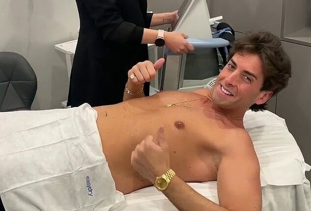 James Argent displays his 14st weight loss as he removes shirtless for belly sculpting treatment